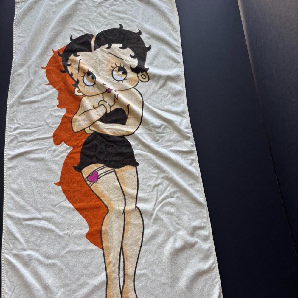 Betty Boop graphic beach towel in orange, black and pink